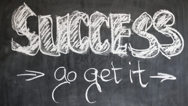 chalk board with the message "success, go get it" written on it.