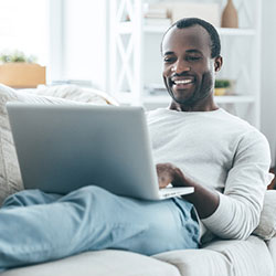 man on laptop at home